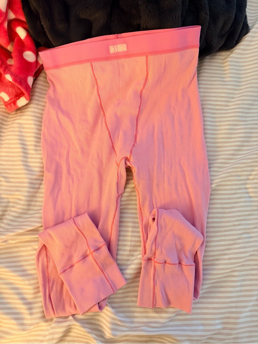 SKIMS Pink Ribbed Lounge Leggings